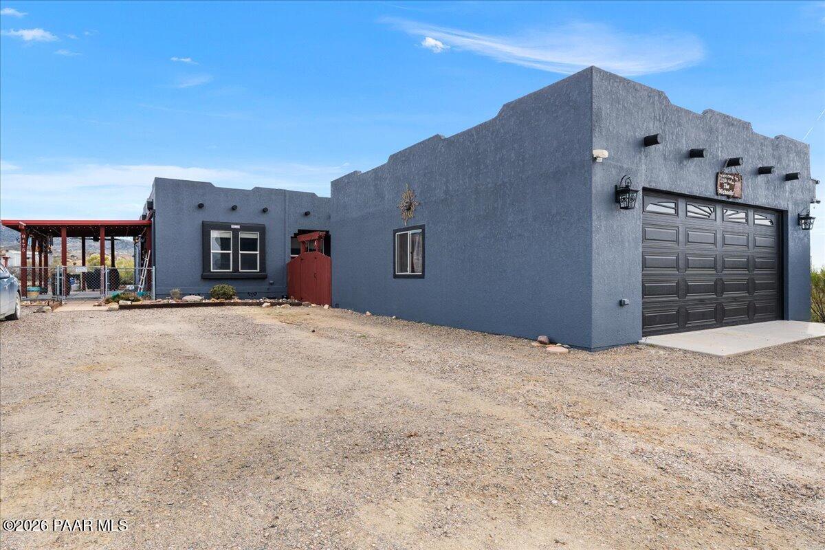 8475 West Red Rock Road Kirkland, AZ 86332 - Photo 4 of 39 a house view with a outdoor space