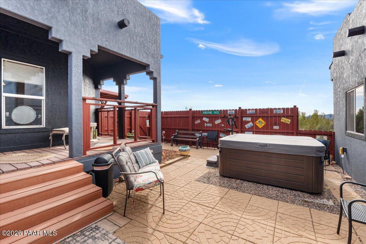 8475 West Red Rock Road Kirkland, AZ 86332 - Photo 5 of 39 a living room with furniture and a fireplace