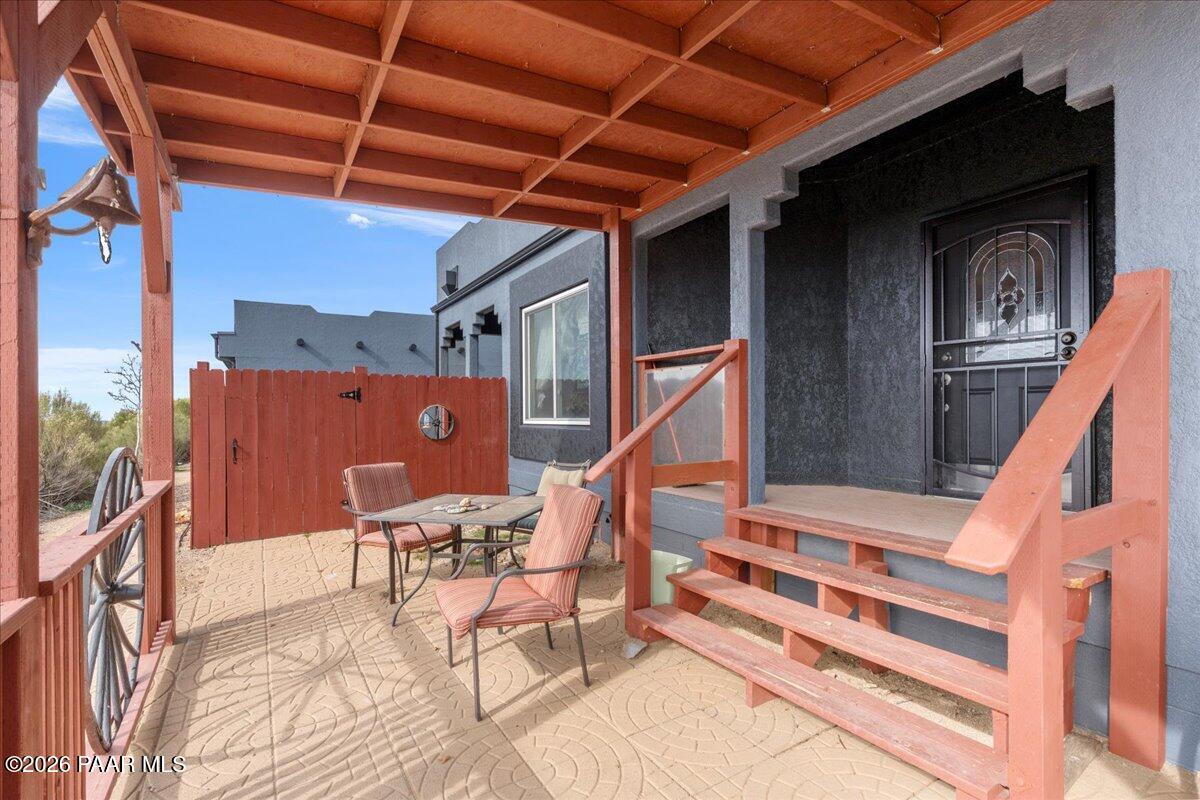 8475 West Red Rock Road Kirkland, AZ 86332 - Photo 10 of 39 a outdoor space with seating