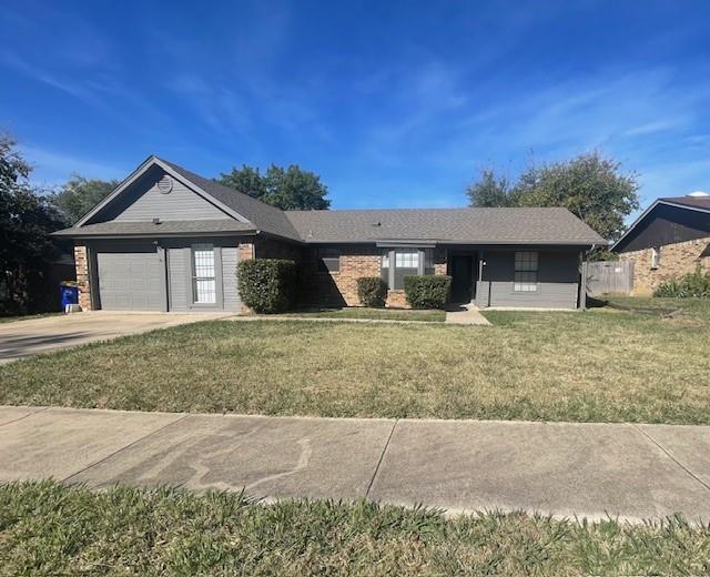 6413 Alta Vista Drive Watauga, TX 76148 - Photo 2 of 21 a front view of a house with a yard