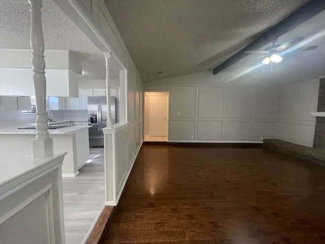 a view of a kitchen with a sink