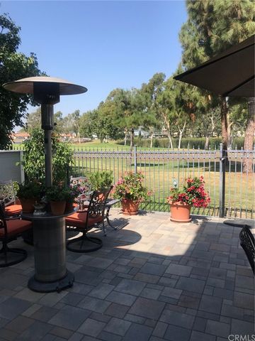 a view of a patio with table and chairs potted plants with wooden floor