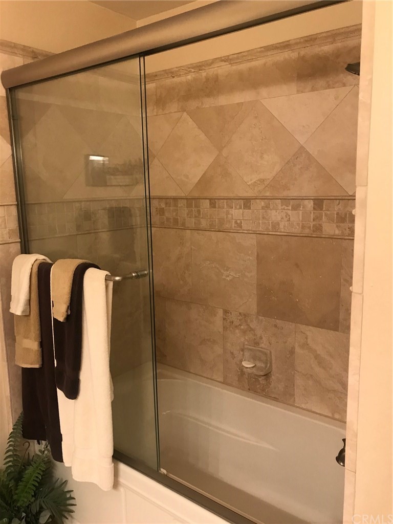 6053 Loynes Drive Long Beach, CA 90803 - Photo 14 of 21 a bathroom with a shower