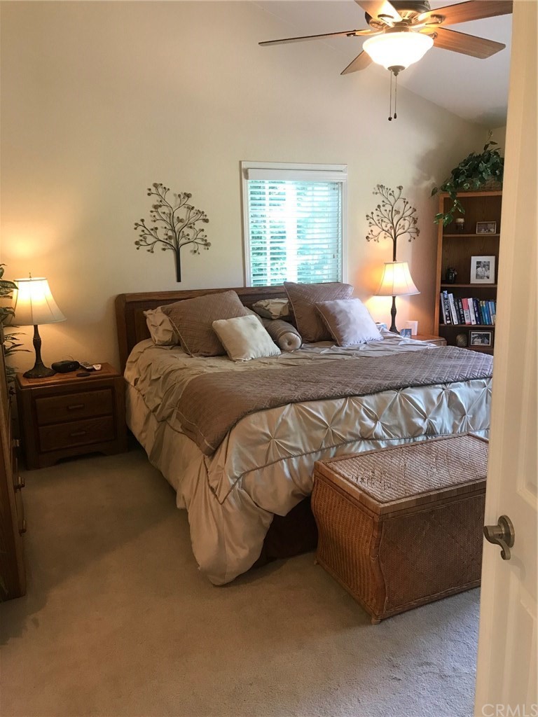 6053 Loynes Drive Long Beach, CA 90803 - Photo 16 of 21 a bed sitting in a bedroom next to a window