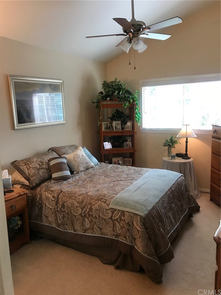 6053 Loynes Drive Long Beach, CA 90803 - Photo 18 of 21 a bedroom with bed and window