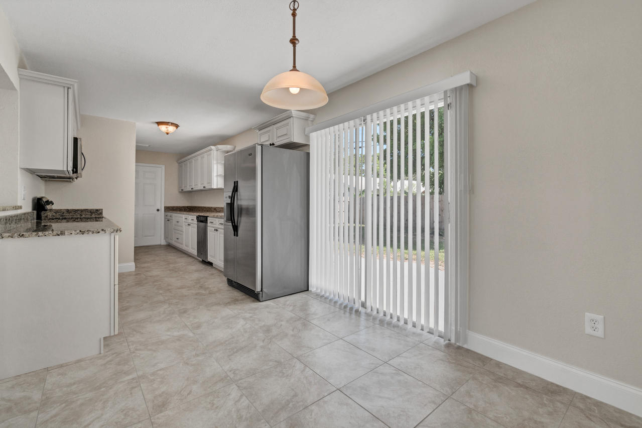 3526 Ivanhoe Avenue Boynton Beach, FL 33436 - Photo 9 of 29 a view of a kitchen with a sink