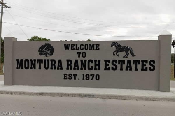 612 Hunting Clb Avenue Montura Ranches, FL 33440 - Photo 36 of 49 a view of a sign board