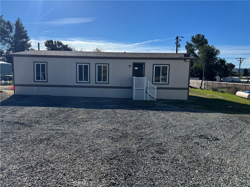 28110 Winchester Road Winchester, CA 92596 - Photo 2 of 36 a view of a house with a backyard