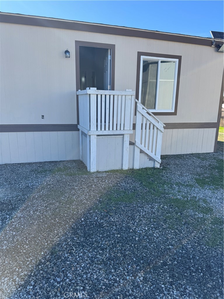 28110 Winchester Road Winchester, CA 92596 - Photo 26 of 36 a view of a house with a yard