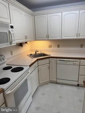 a view of a refrigerator and window
