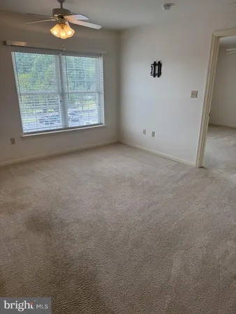 a view of a livingroom with furniture