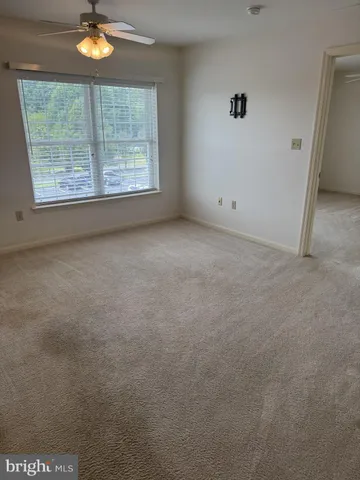 a view of a livingroom with furniture