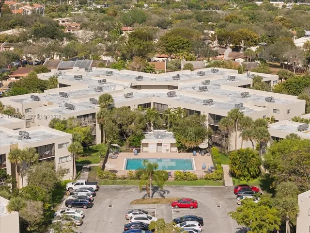 an aerial view of a city with lots of residential buildings