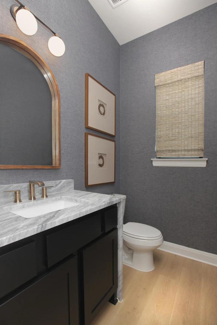 2033 Morning Mist Drive Georgetown, TX 78628 - Photo 21 of 36 a bathroom with a granite countertop toilet sink and mirror