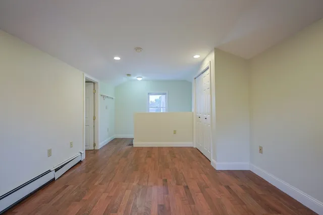 a bathroom with a bathtub and toilet