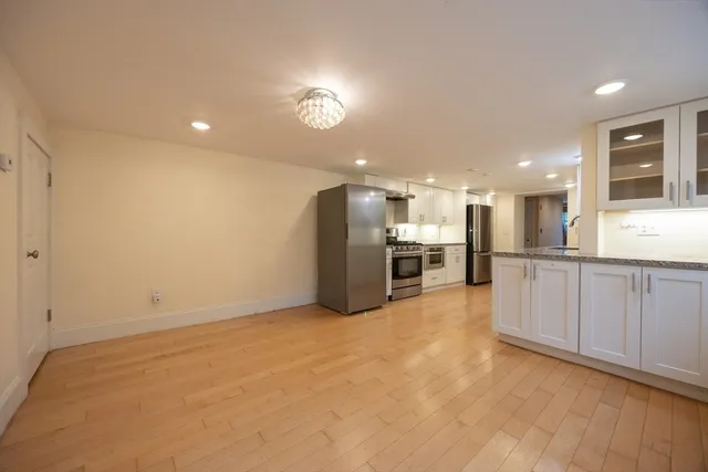 a view of a kitchen with a sink
