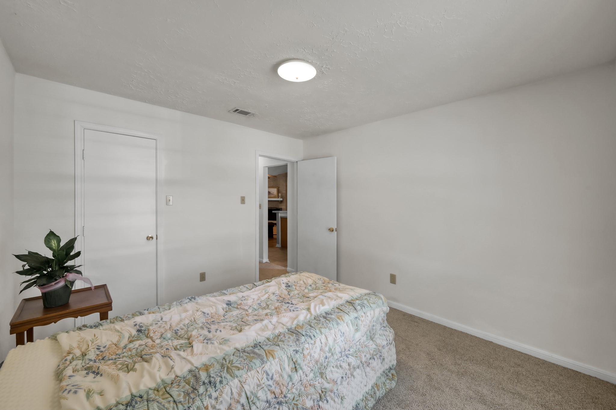 4314 Enchantedgate Drive Spring, TX 77373 - Photo 29 of 47 Guest bedroom with neutral walls and a generous walk in closet.