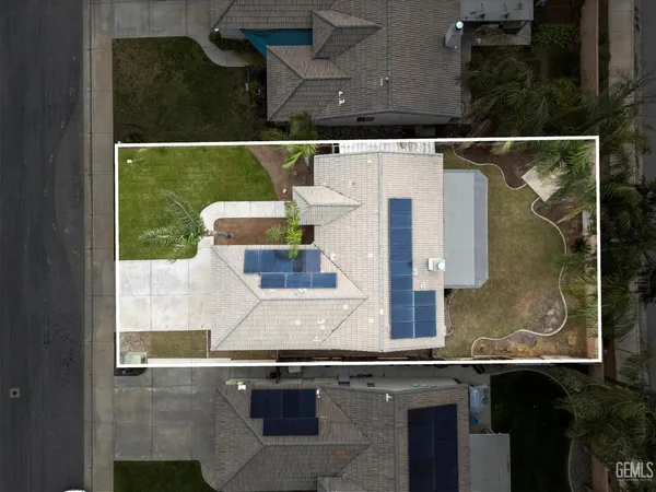 a house view with a garden space