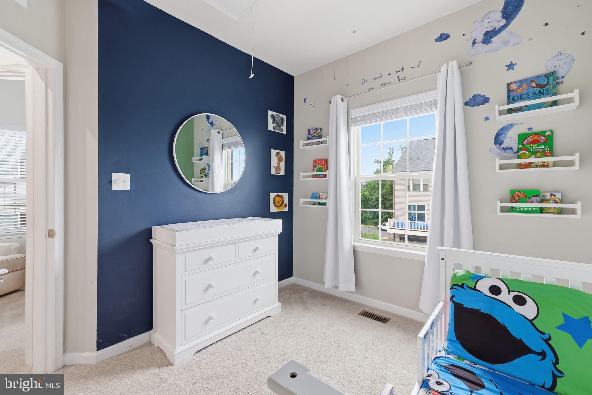 3012 Bretons Ridge Way Hanover, MD 21076 - Photo 26 of 37 a bedroom with a bed and a window