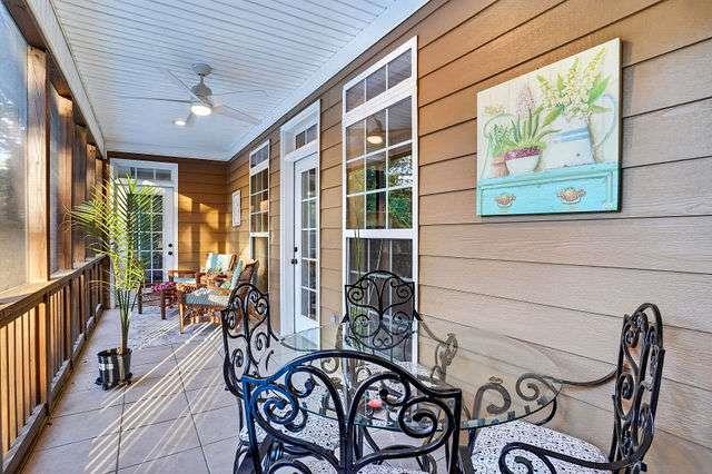 8179 Pineview Court Villa Rica, GA 30180 - Photo 13 of 41 a view of a patio with table and chairs and potted plants