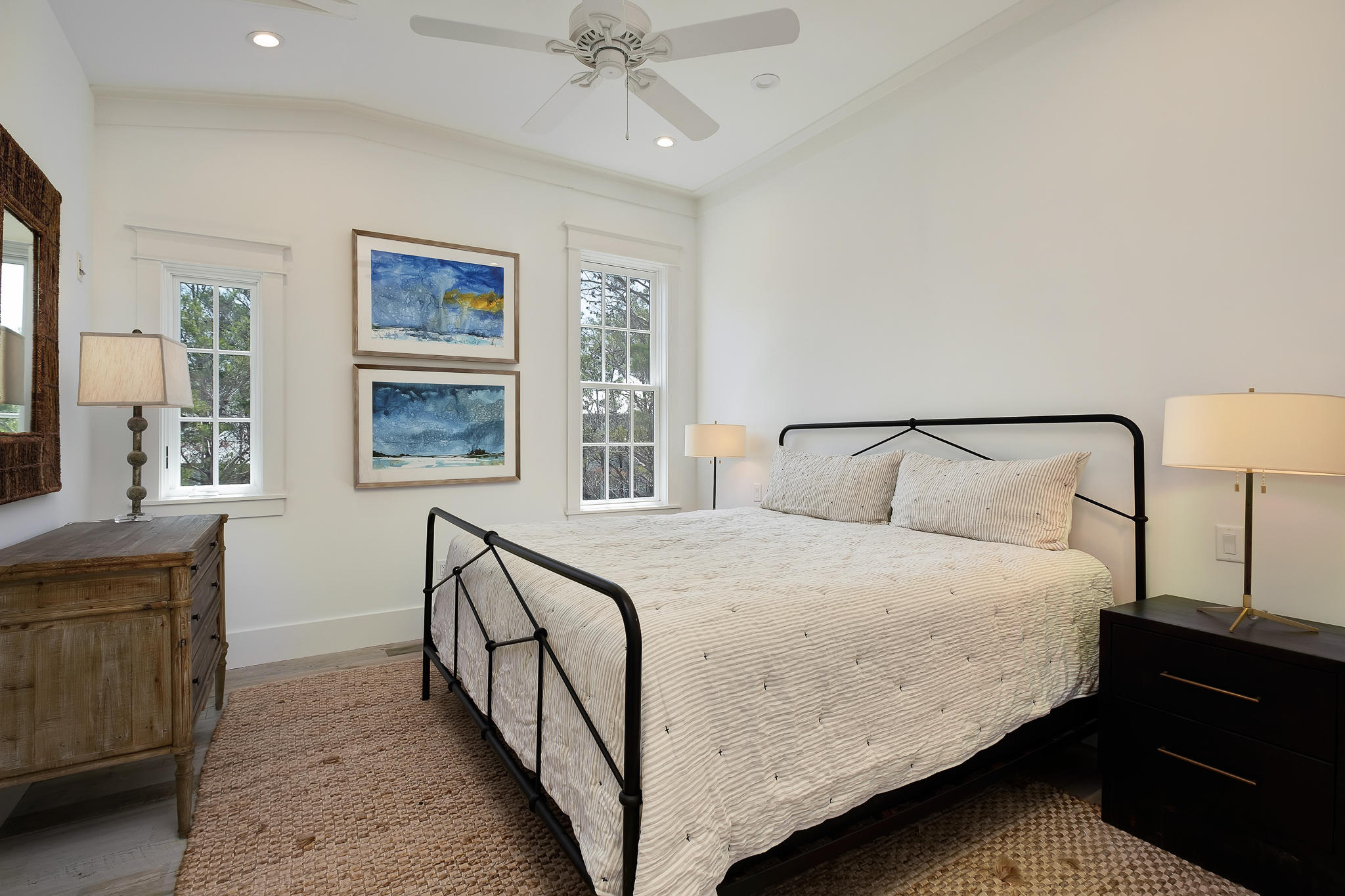 28 Rainer Ln Inlet Beach Inlet Beach, FL 32461 - Photo 26 of 39 a bedroom with a bed and a chandelier