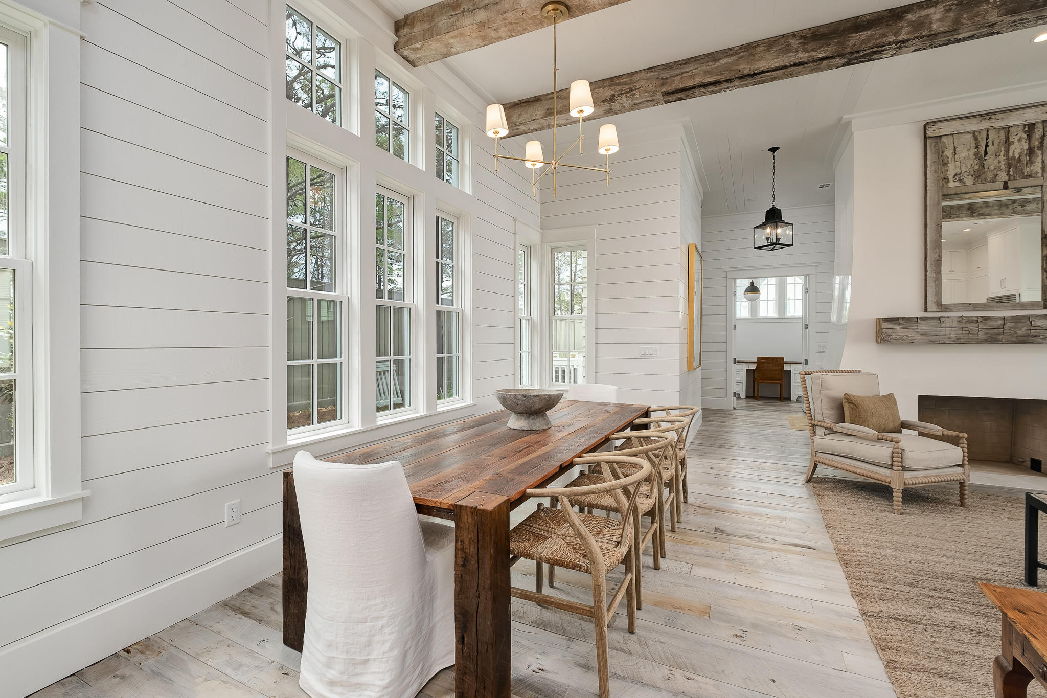 28 Rainer Ln Inlet Beach Inlet Beach, FL 32461 - Photo 4 of 39 a view of a dining room with furniture and wooden floor