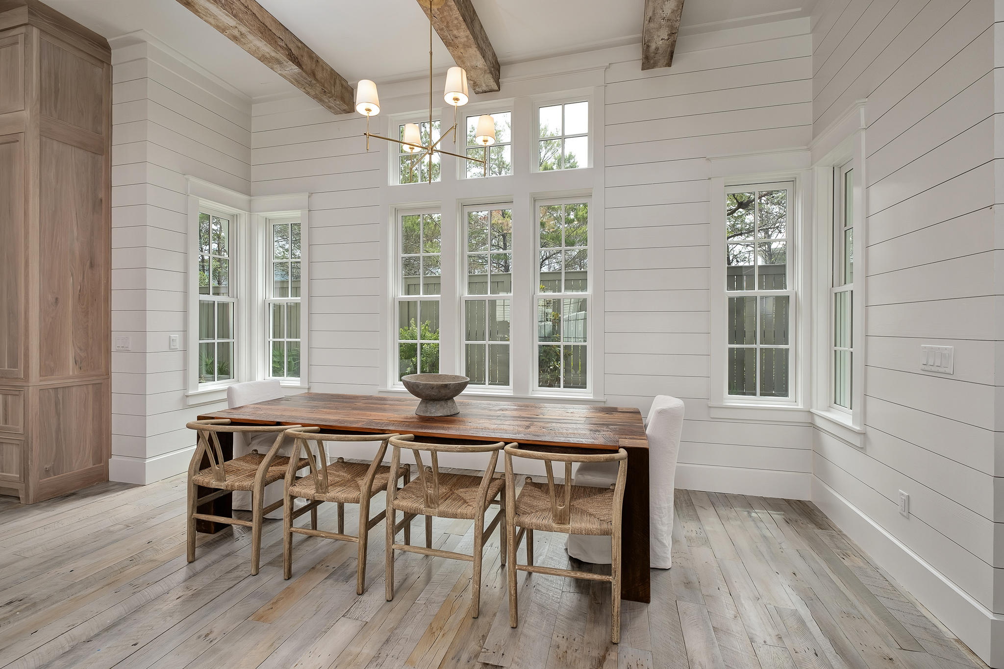 28 Rainer Ln Inlet Beach Inlet Beach, FL 32461 - Photo 5 of 39 a view of a dining room with furniture wooden floor and chandelier