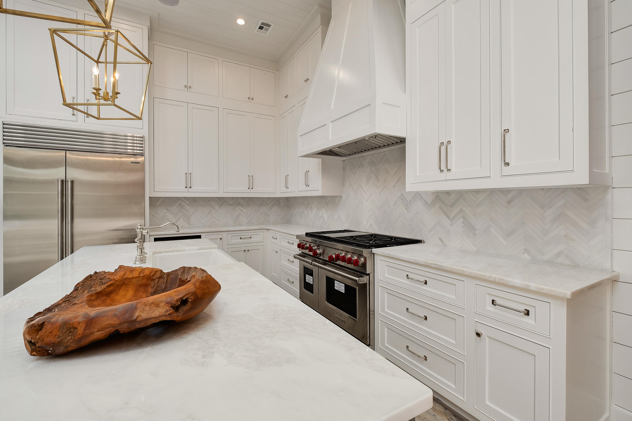 28 Rainer Ln Inlet Beach Inlet Beach, FL 32461 - Photo 7 of 39 a kitchen with granite countertop a sink a stove and cabinets