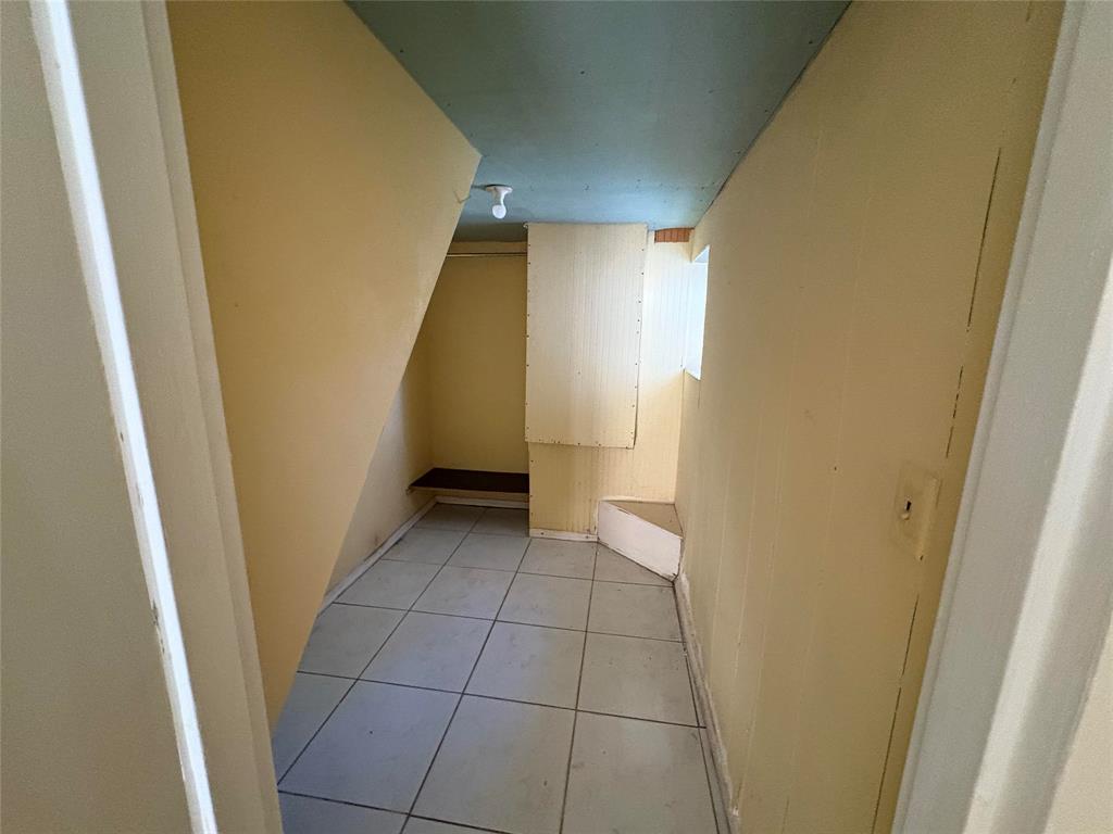 45 Northeast 146th Street, Unit B Miami, FL 33161 - Photo 13 of 16 a view of entryway with a window and stairs