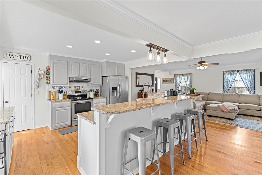 200 Poore Road Piedmont, SC 29673 - Photo 12 of 44 This open concept kitchen flows seamlessly into the living space, perfect for entertaining.