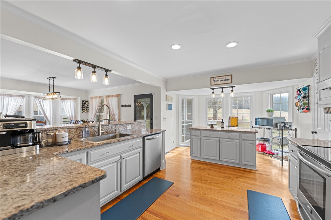 200 Poore Road Piedmont, SC 29673 - Photo 14 of 44 This spacious kitchen features ample counter space, modern appliances, and abundant natural light.