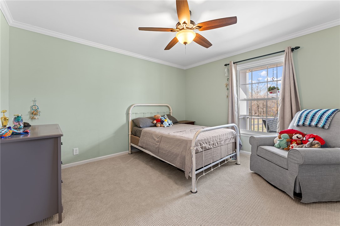 200 Poore Road Piedmont, SC 29673 - Photo 27 of 44 This cozy room features soft carpeting and a bright window, perfect for rest and relaxation.