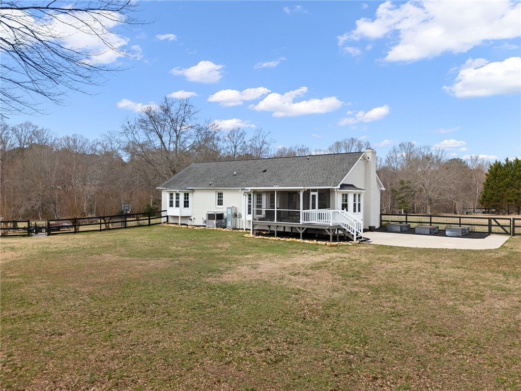 200 Poore Road Piedmont, SC 29673 - Photo 38 of 44 This residence offers a spacious backyard with a private deck, perfect for outdoor living.
