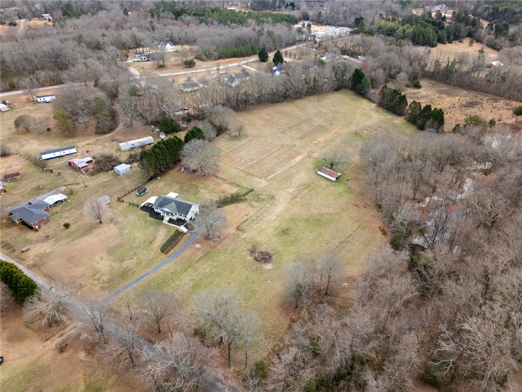 200 Poore Road Piedmont, SC 29673 - Photo 40 of 44 An expansive rural property featuring a welcoming home, mature trees, and ample open land.