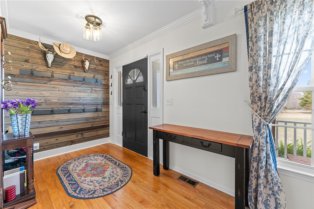 200 Poore Road Piedmont, SC 29673 - Photo 4 of 44 Step inside this inviting entry, featuring wood flooring and a beautiful entryway door.