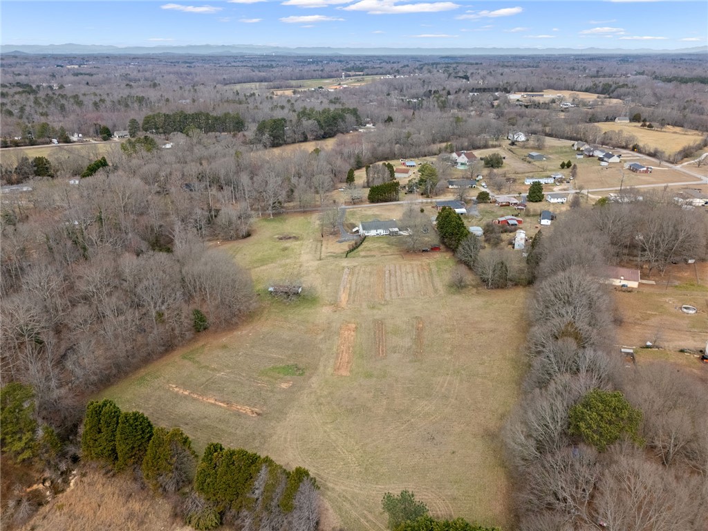 200 Poore Road Piedmont, SC 29673 - Photo 42 of 44 This expansive rural property offers a vast land area with distant mountain views.