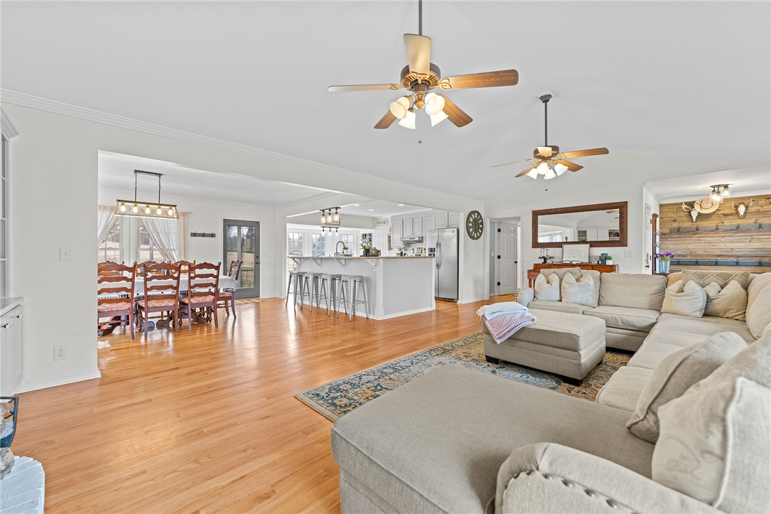 200 Poore Road Piedmont, SC 29673 - Photo 7 of 44 This inviting space features an open-concept layout with gleaming hardwood floors and ample natural light.