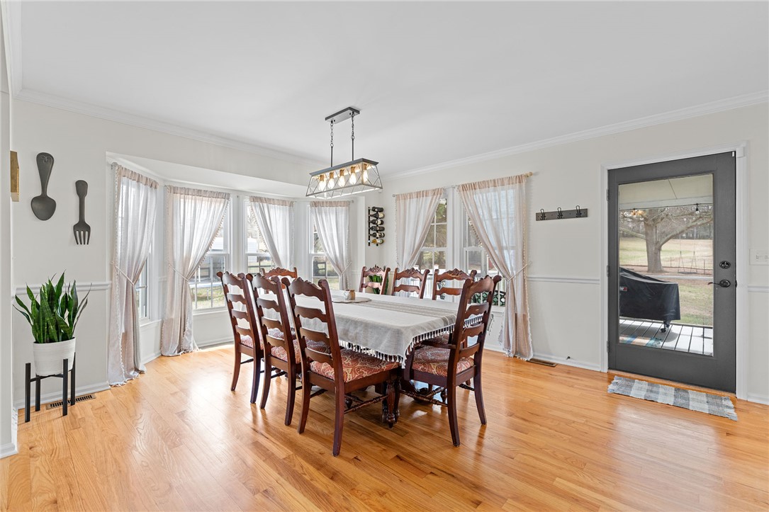 200 Poore Road Piedmont, SC 29673 - Photo 10 of 44 This bright dining area features ample natural light and direct outdoor access.