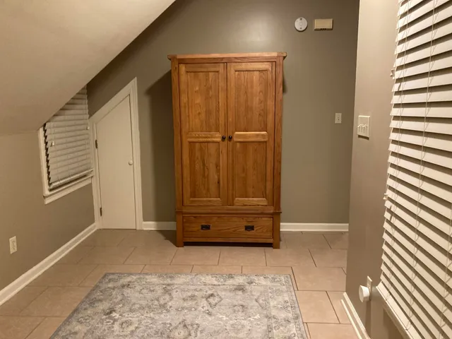 a view of front door with a bathroom