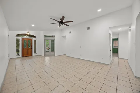 a view of an empty room and window