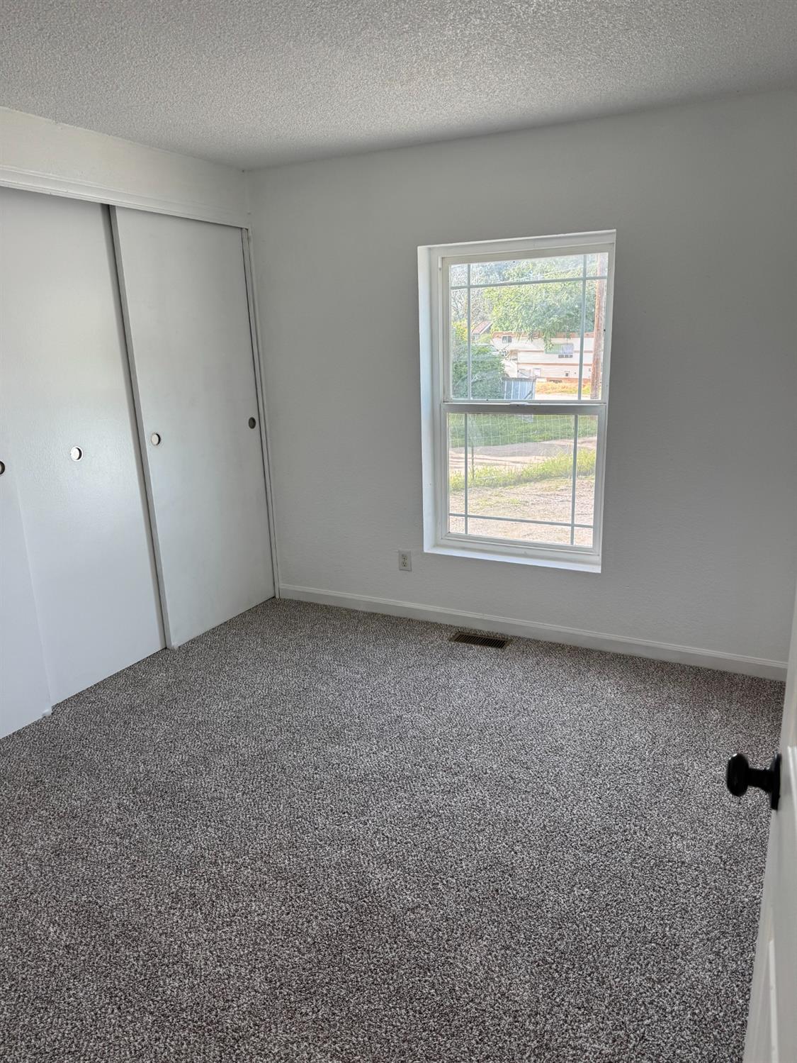 28640 Ward Street Madera, CA 93638 - Photo 14 of 31 an empty room with a window