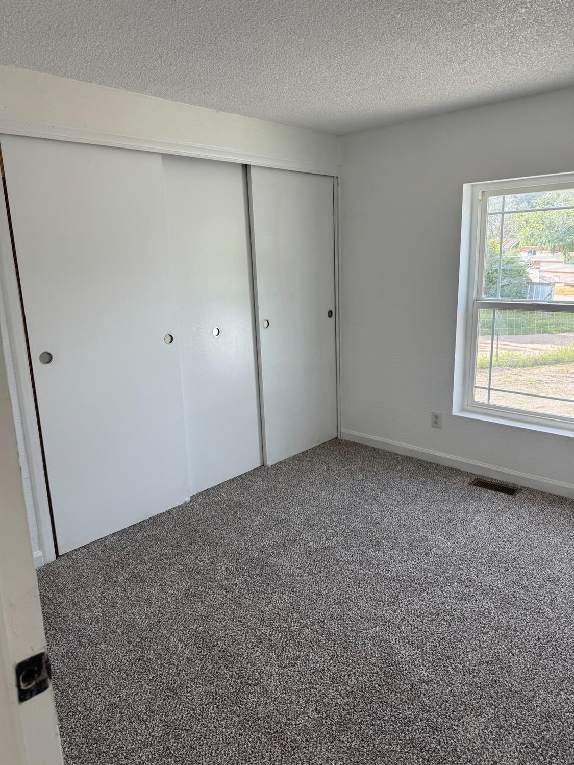 28640 Ward Street Madera, CA 93638 - Photo 15 of 31 a view of an empty room with a window