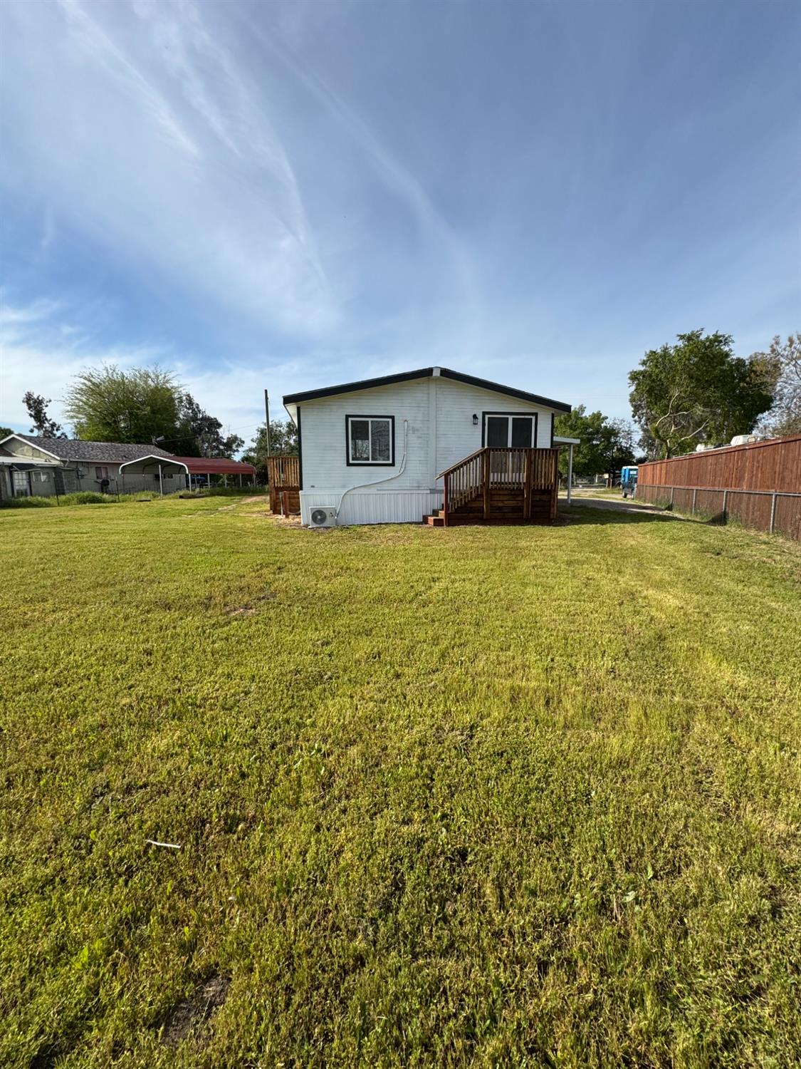 28640 Ward Street Madera, CA 93638 - Photo 30 of 31 a house view with a garden space