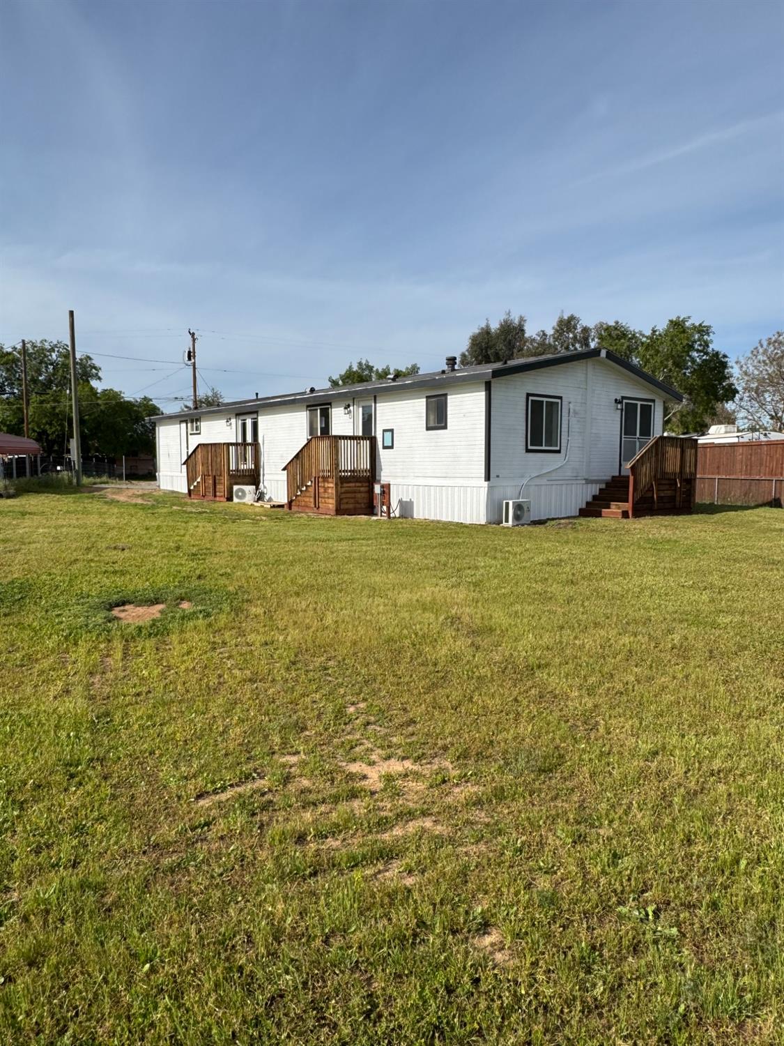 28640 Ward Street Madera, CA 93638 - Photo 31 of 31 a house view with a garden space