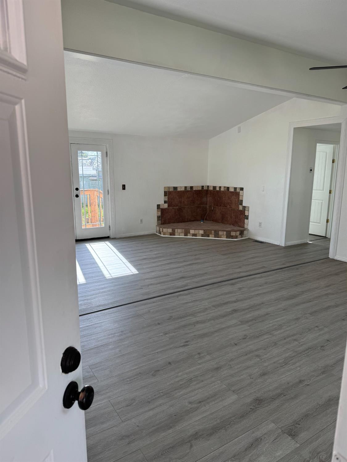 28640 Ward Street Madera, CA 93638 - Photo 4 of 31 a view of a livingroom with wooden floor
