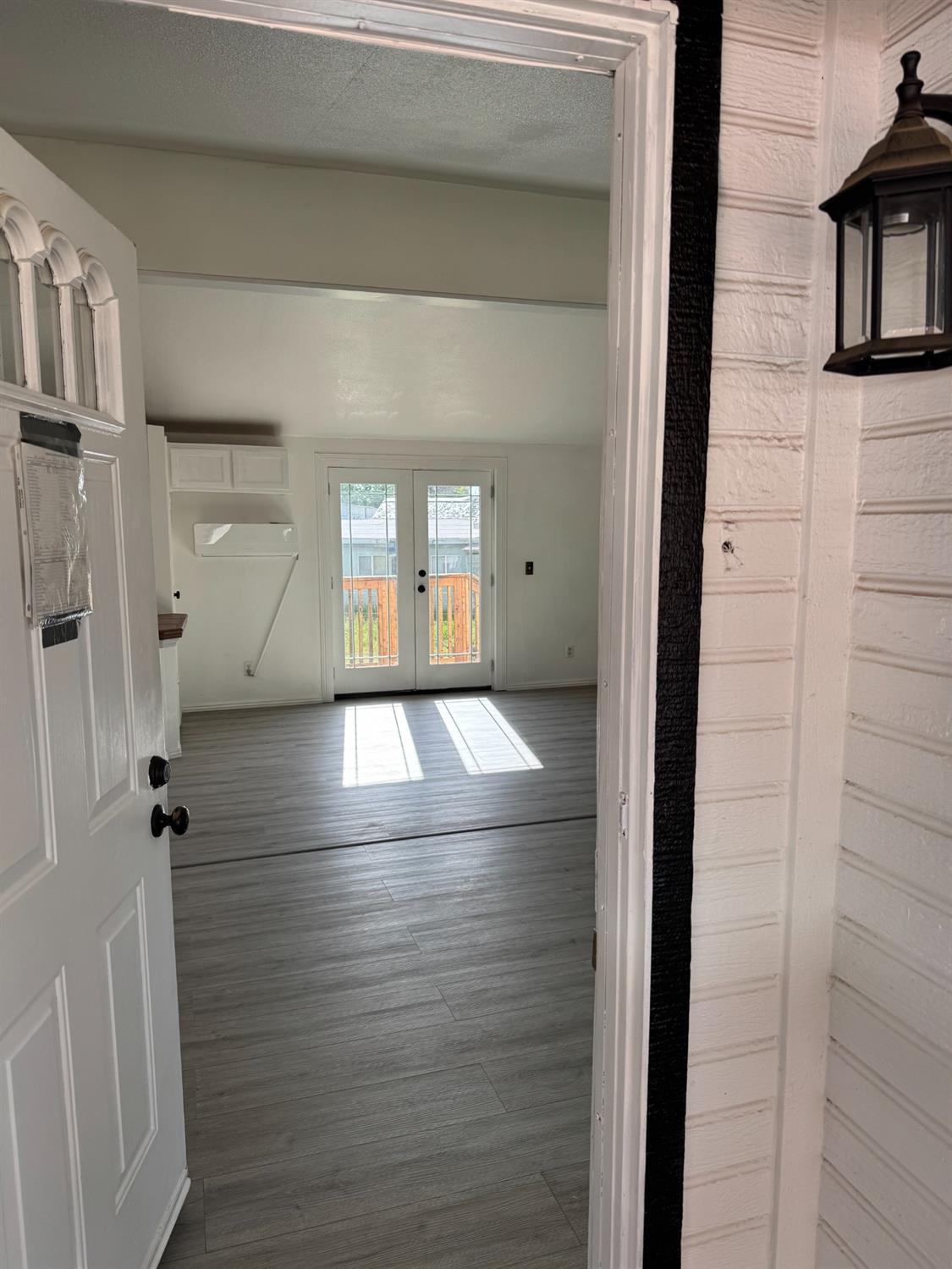 28640 Ward Street Madera, CA 93638 - Photo 5 of 31 a view of a hallway with wooden floor and staircase
