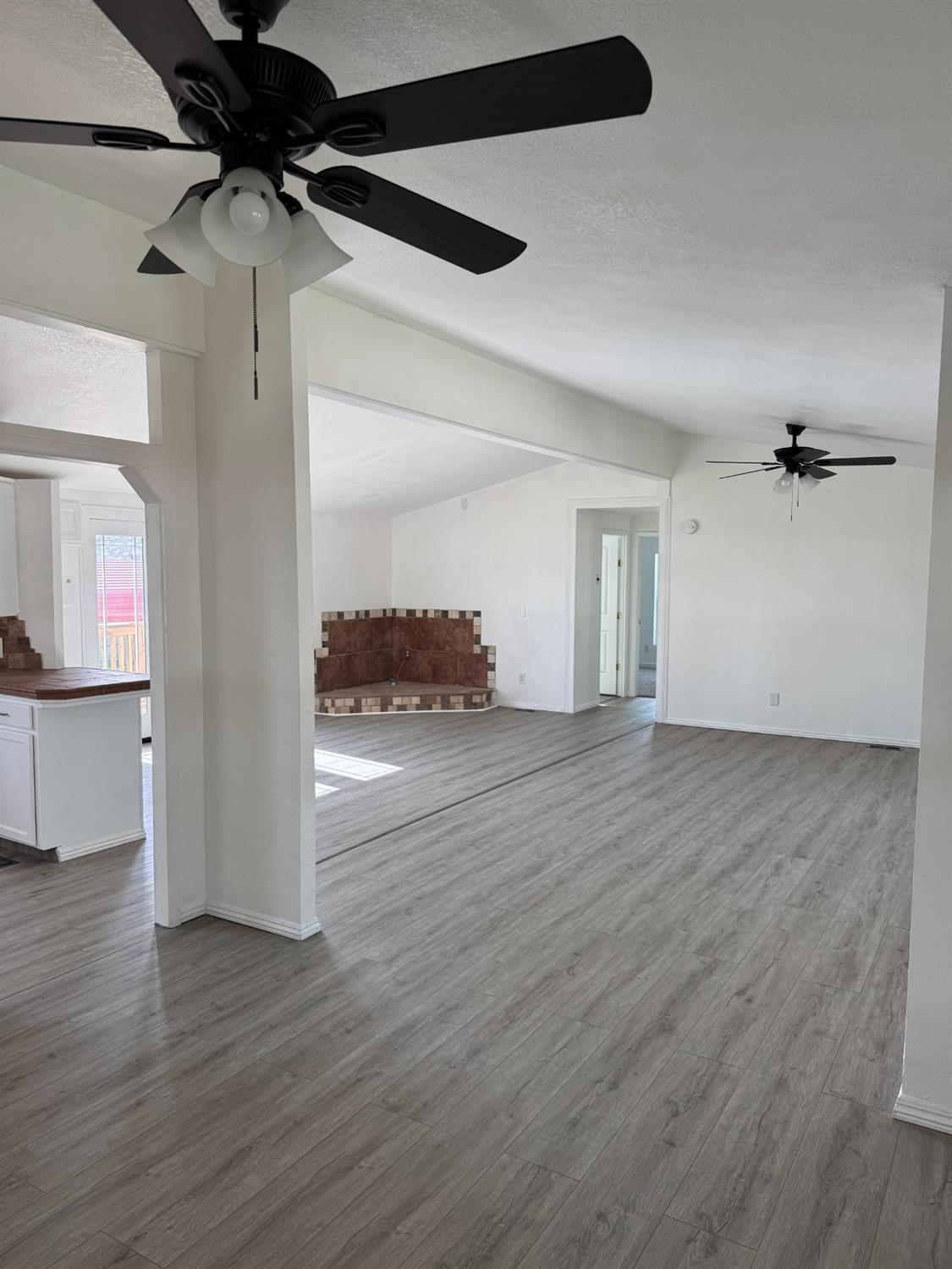 28640 Ward Street Madera, CA 93638 - Photo 6 of 31 a view of empty room with wooden floor
