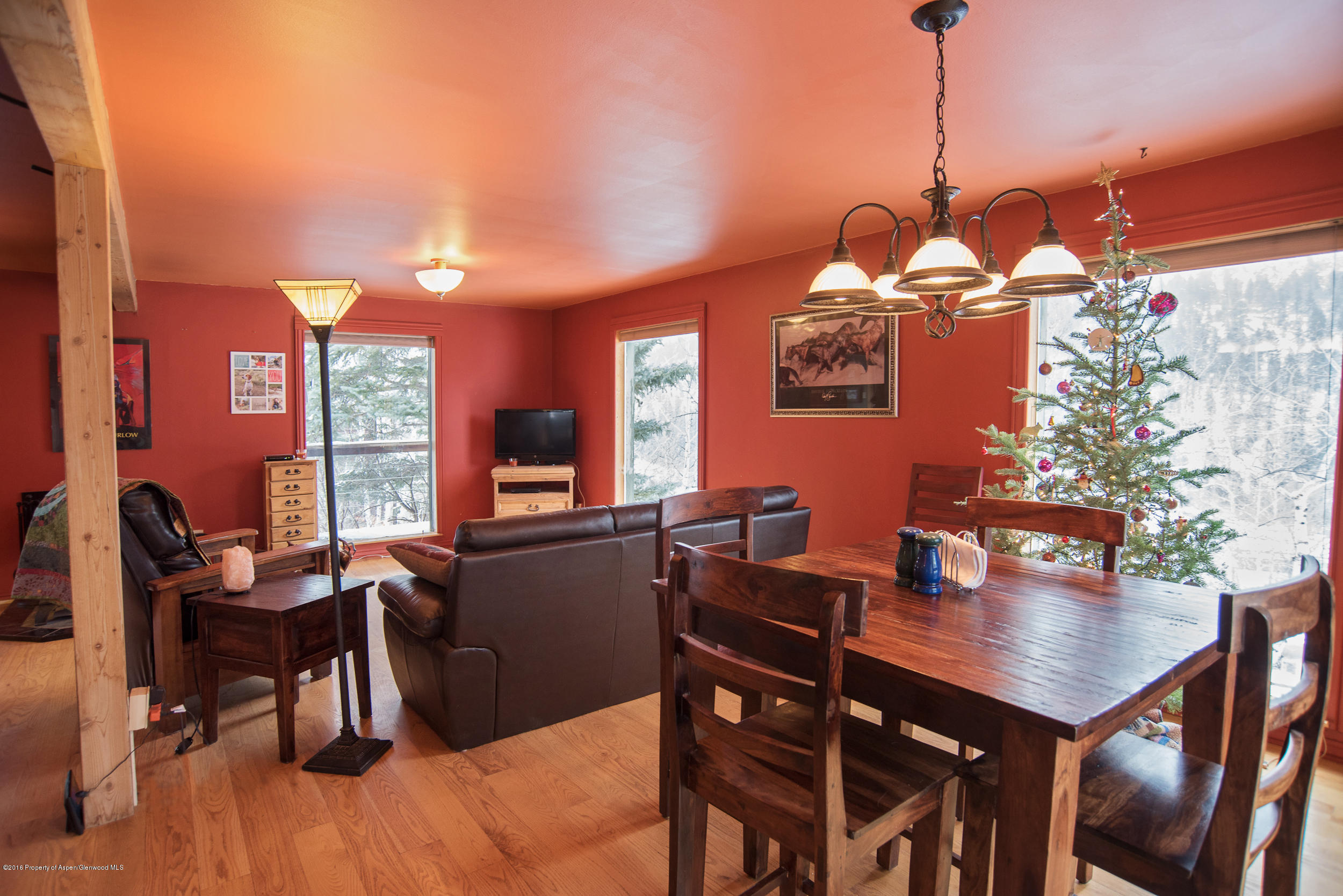 357 Elk Mountain Drive Redstone, CO 81623 - Photo 11 of 40 a view of a dining room with furniture and window