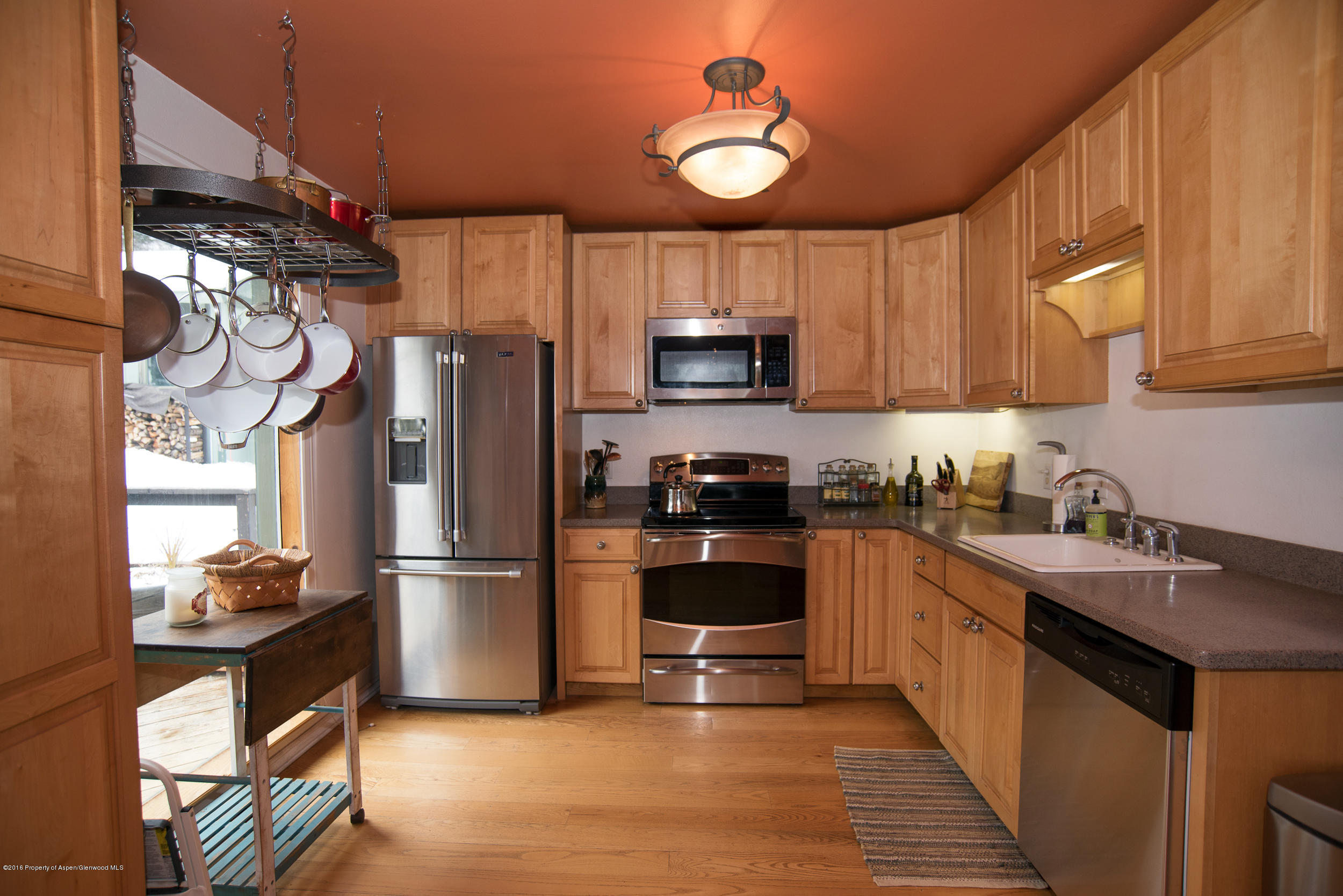 357 Elk Mountain Drive Redstone, CO 81623 - Photo 15 of 40 a kitchen with stainless steel appliances granite countertop a refrigerator stove and sink