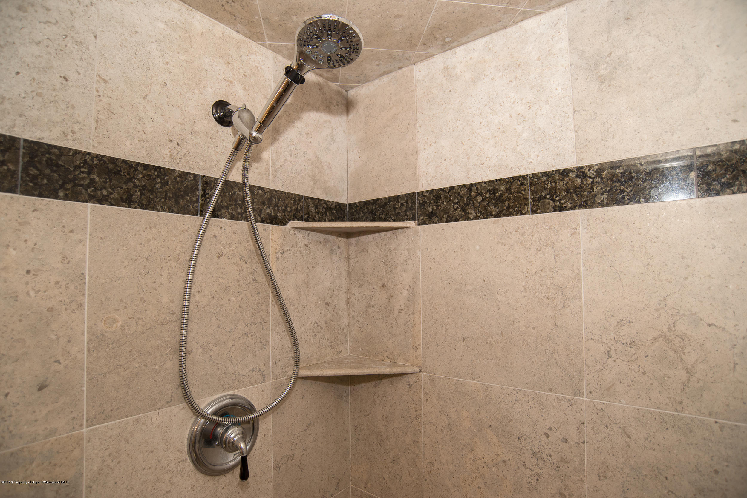 357 Elk Mountain Drive Redstone, CO 81623 - Photo 29 of 40 a bathroom with a shower and a ceiling fan